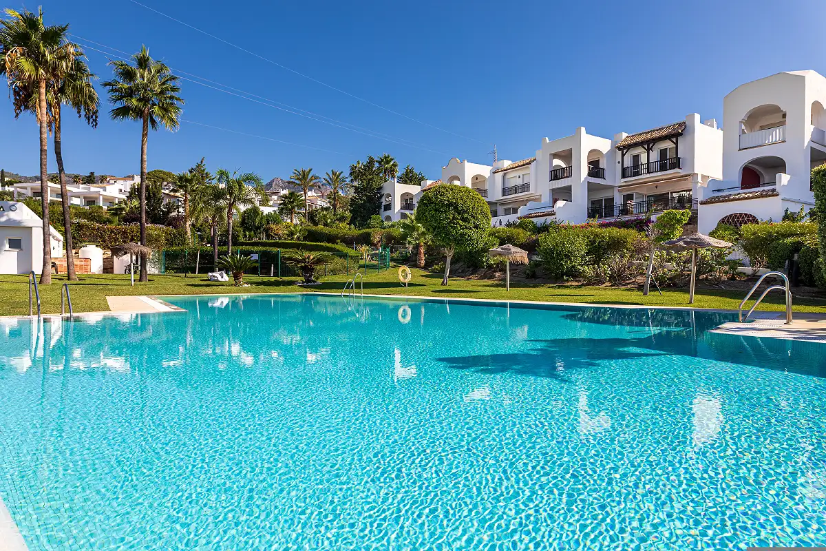 Residential complex with swimming pool in Gran Canaria representing property opportunities for international buyers